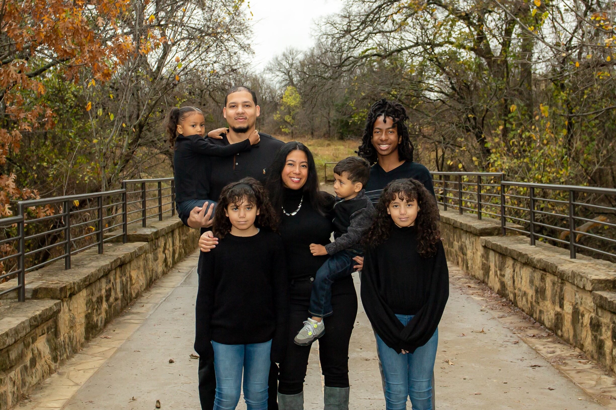 Dasha with her husband, Gerry, and five children. Photo by Inside The Box Photography.