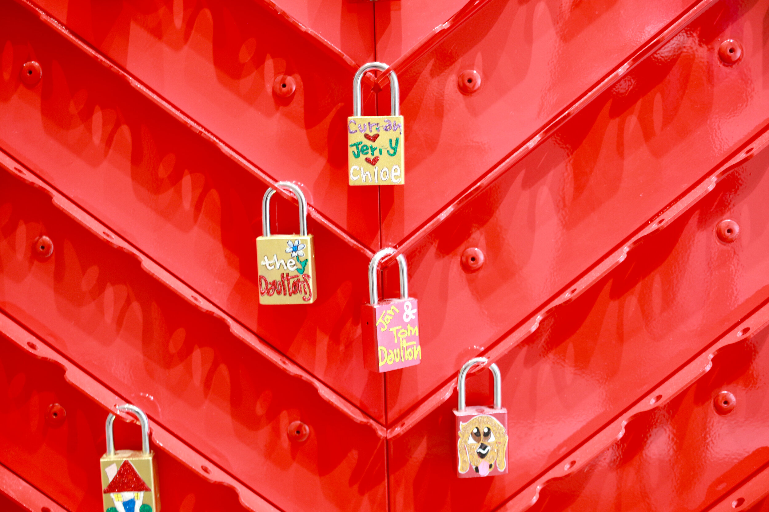 RMHD supporters display their names and artwork on a heart-shaped wall of locks.