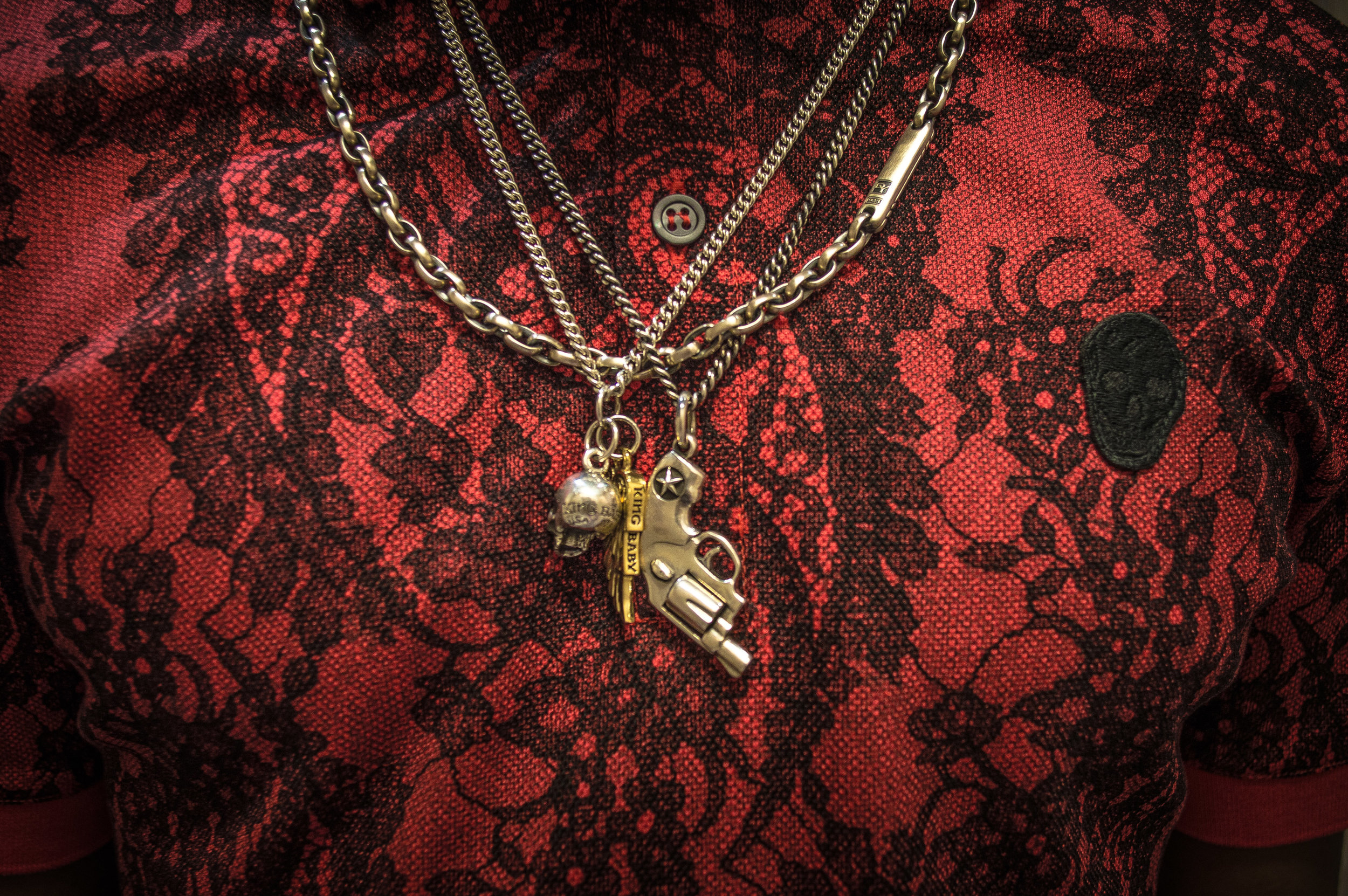mcqueen-wallpaper-polo-with-necklaces.jpg