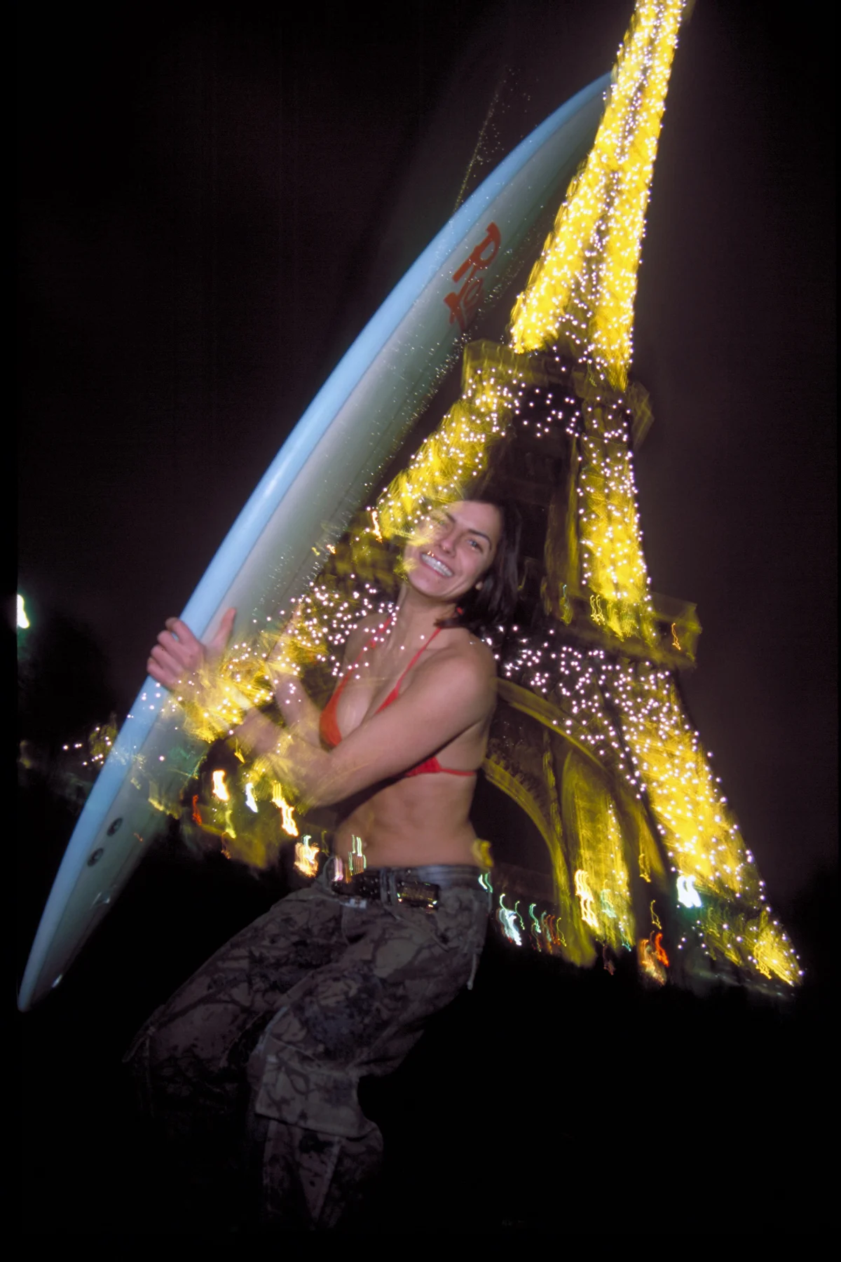 Sonia with Surfboard at Eiffel Tower