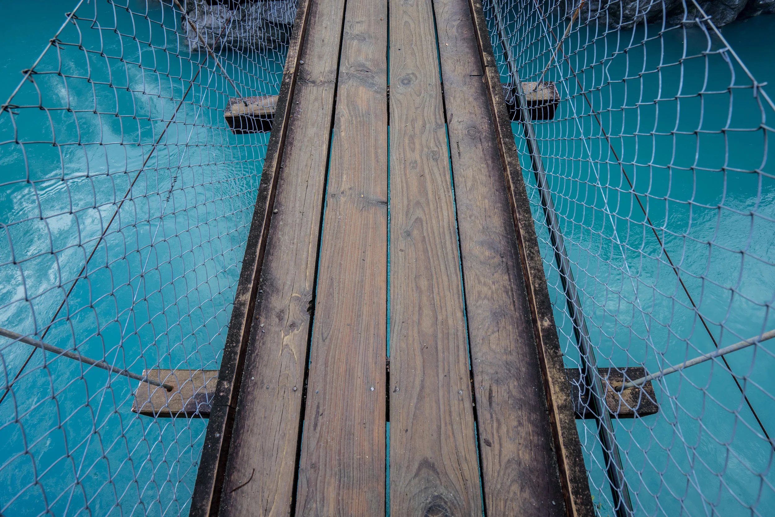 Very unstable swing bridge over the Hokitika River.