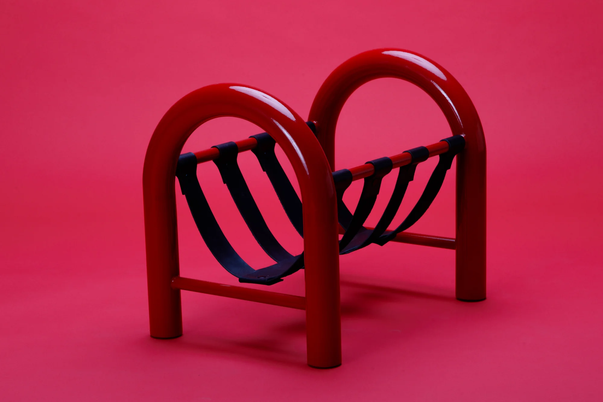 TUBULAR MAGAZINE RACK — ANOTHER HUMAN