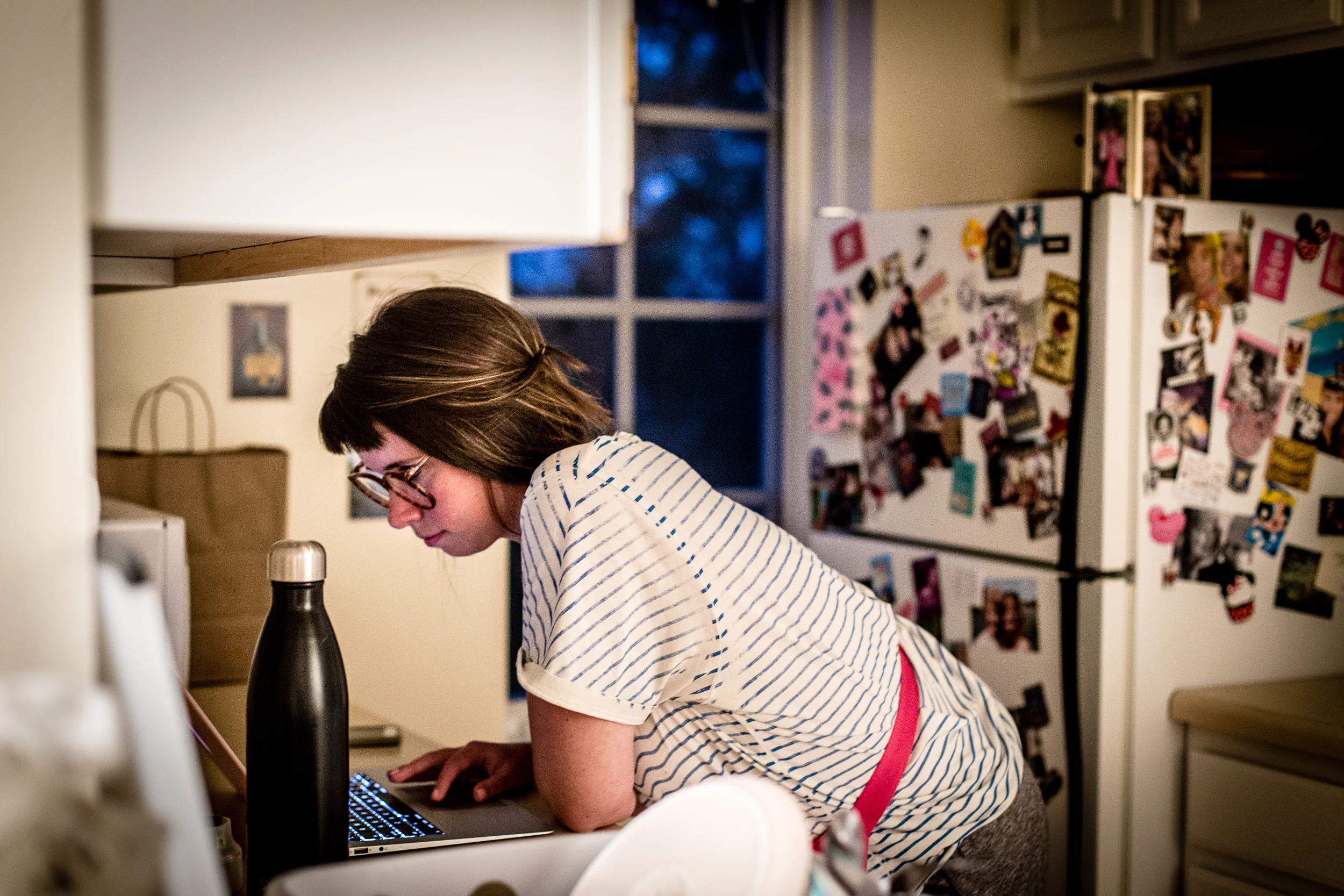 Day 1: Alice making script edits on set.