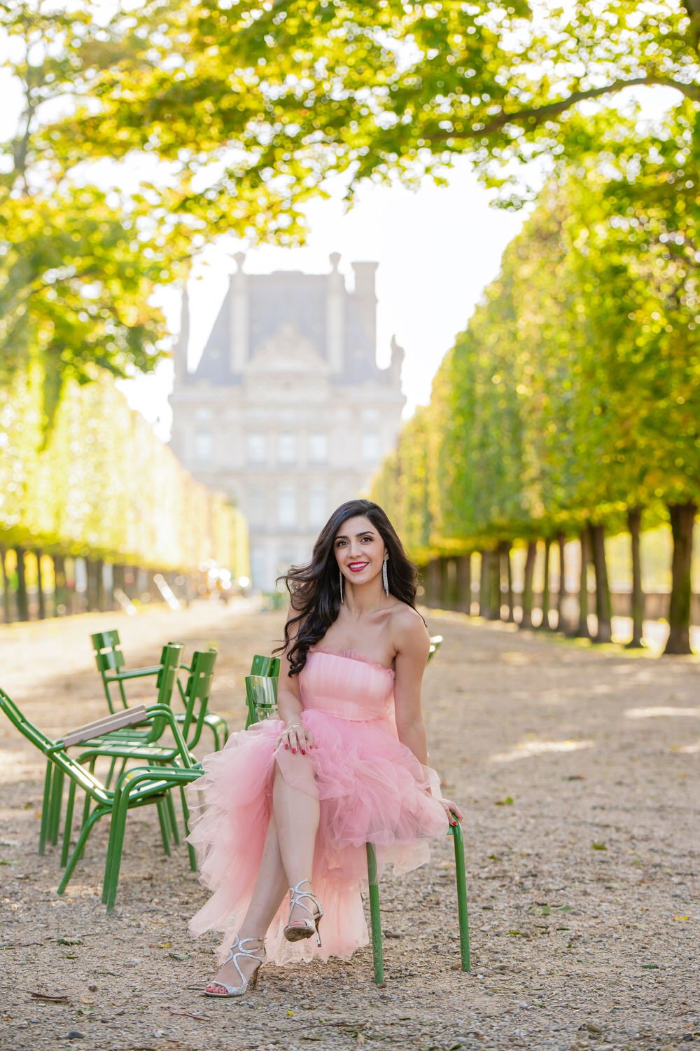Pink tulle dress photoshoot look for Paris Photoshoot in front of the tuilierie gardens. Makeup and hairstyling by Onorina Jomir Beauty