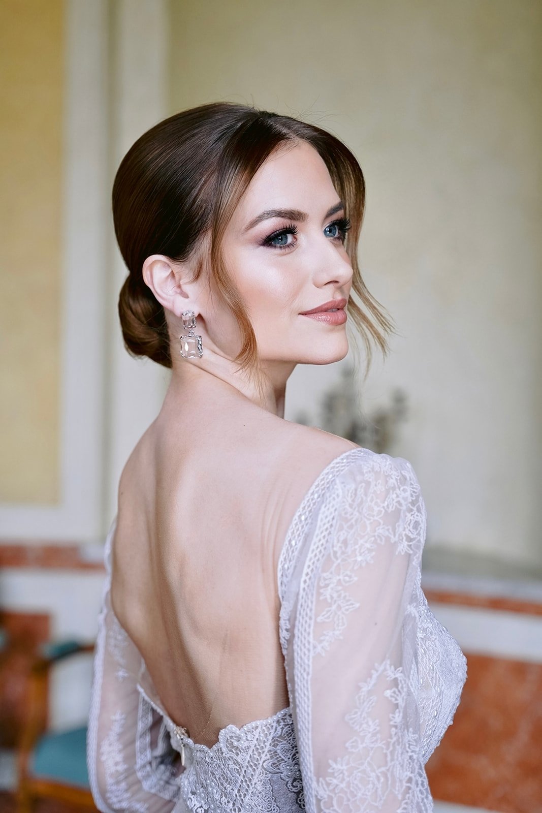 This one is for the glamorous brides who want to make a statement with their bridal look!

Think defined eyes, fluffy lashes, soft contour, glowing skin, the perfect nude lip, a classic low bun, and soft but defined face-framing to draw attention to 