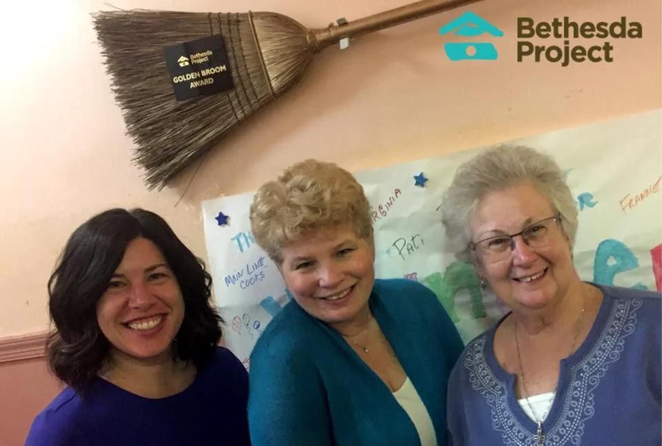 Tina Pagotto, Michelle Marlin &amp; Kathleen Sonnie proudly hang the Golden Broom at Bethesda Spruce!