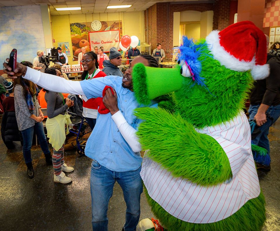 Our Brothers' Place guest Kenneth gets a selfie with the Phanatic!