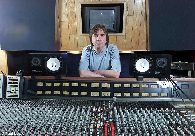 andy with desk.jpg