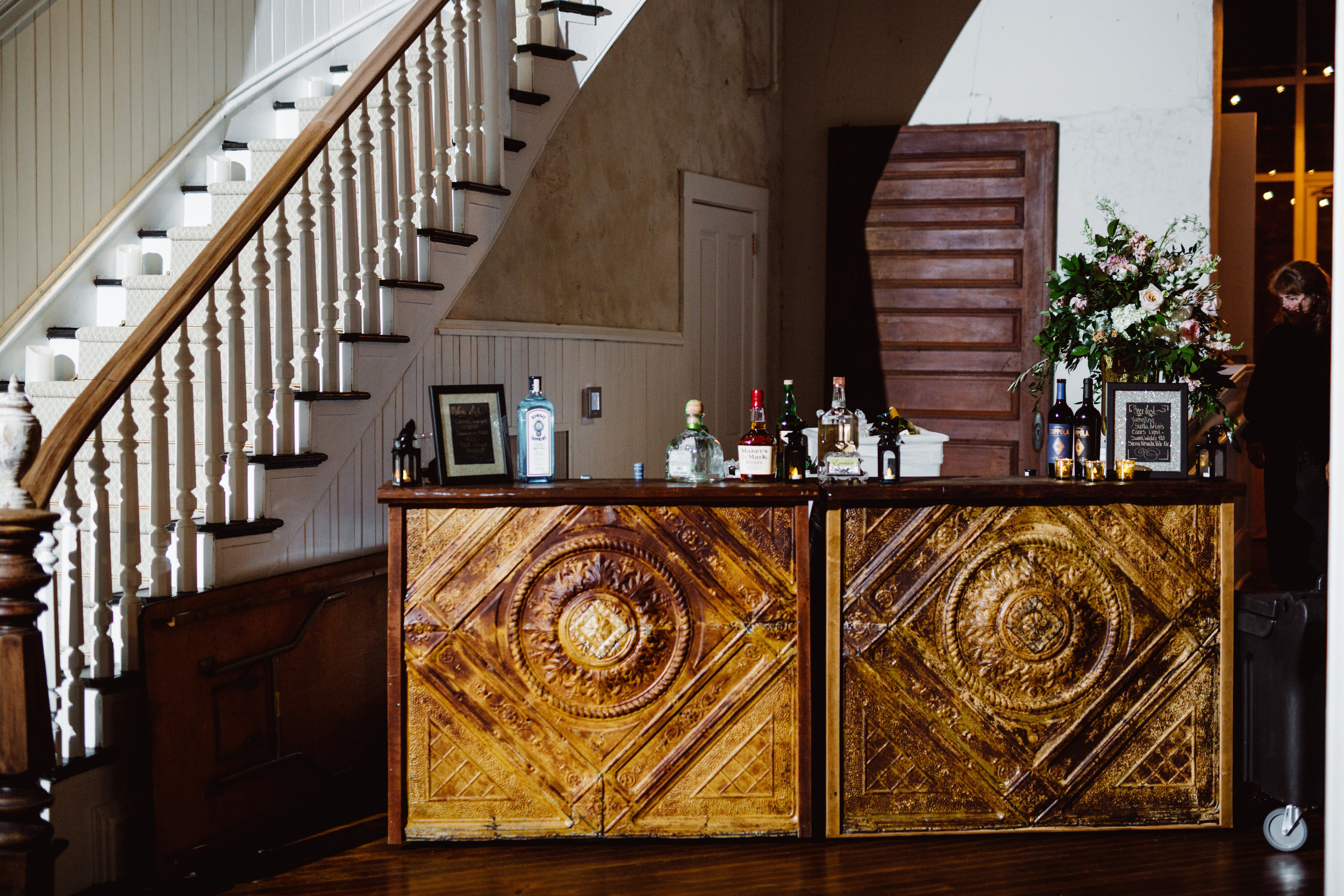 Bar set up at bottom of grand staircase