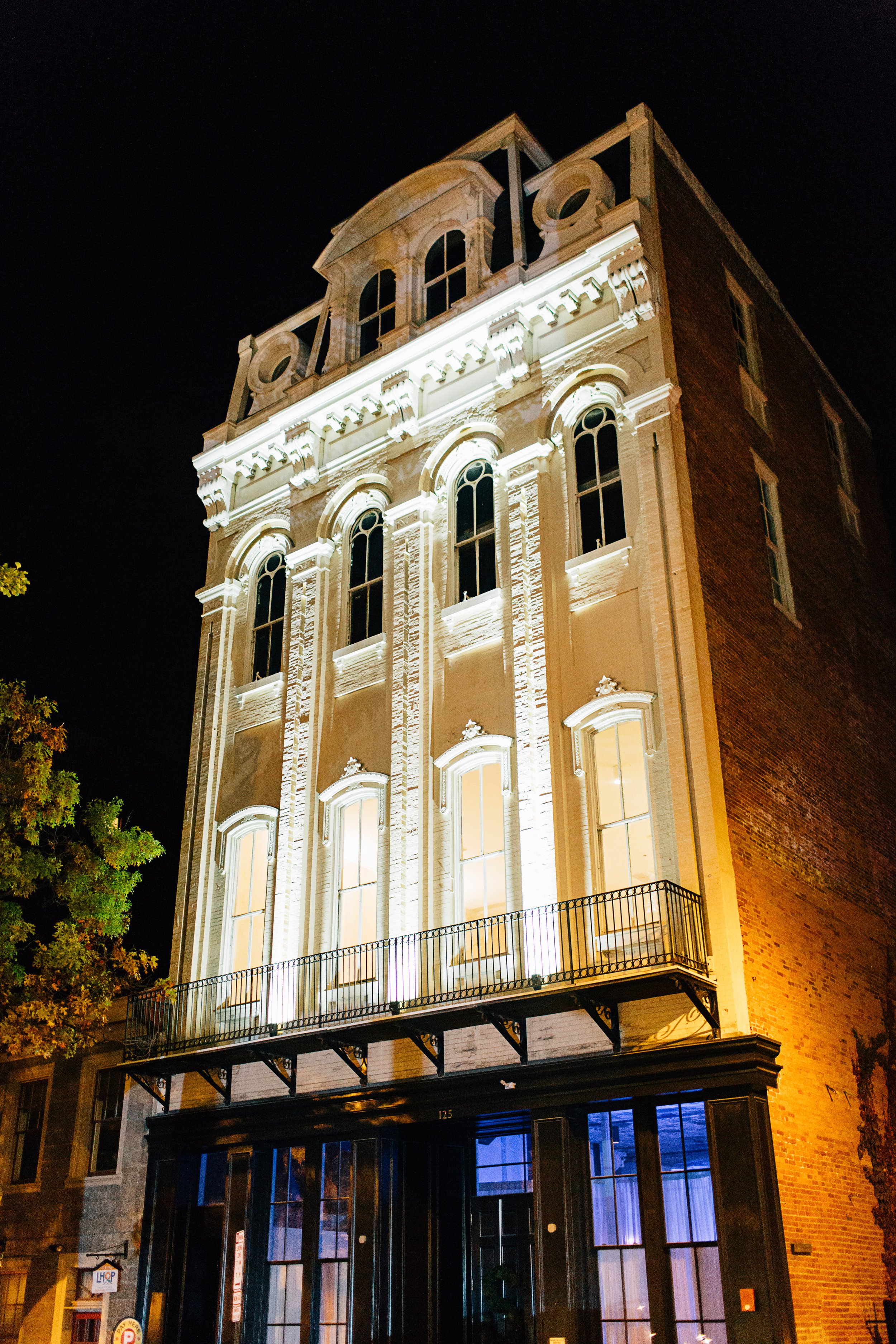 Excelsior facade at night bright light