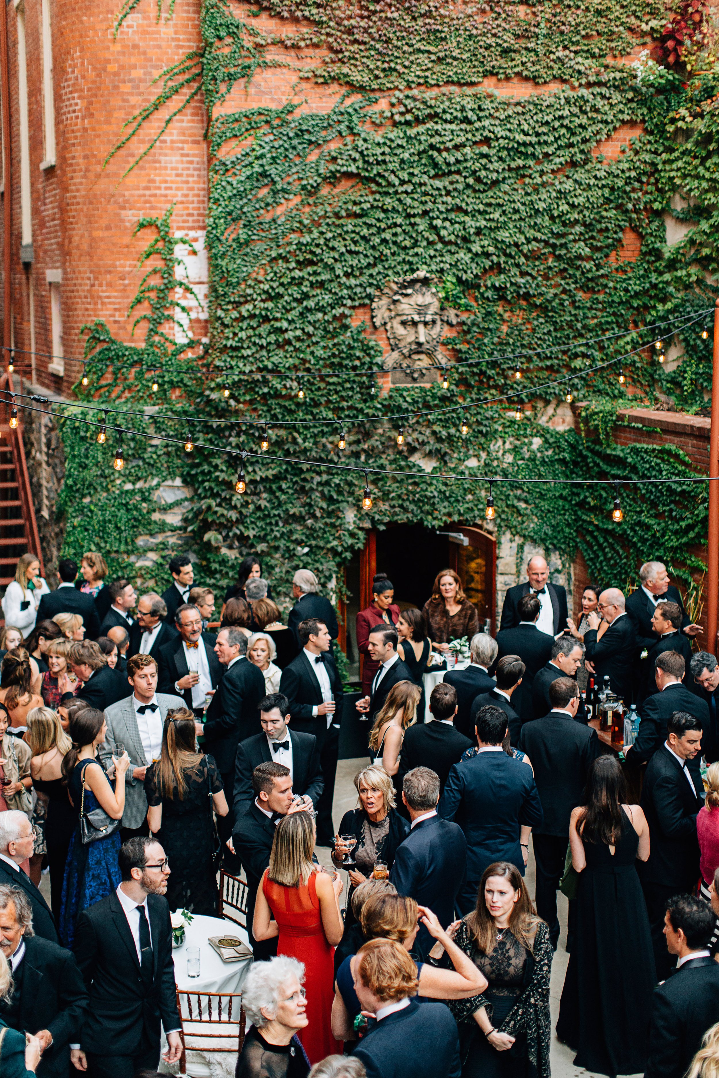 Corporate social event in Garden Courtyard ivy covered brick walls outdoor