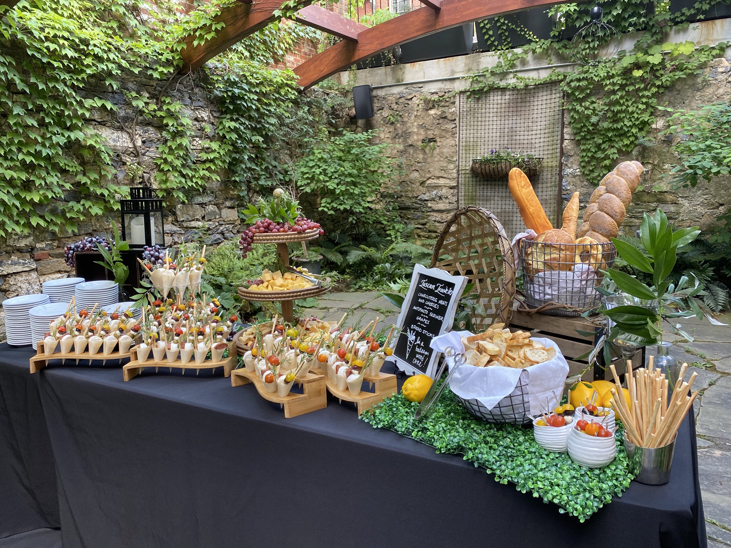 Tuscan traveler appetizer station at Excelsior in garden courtyard