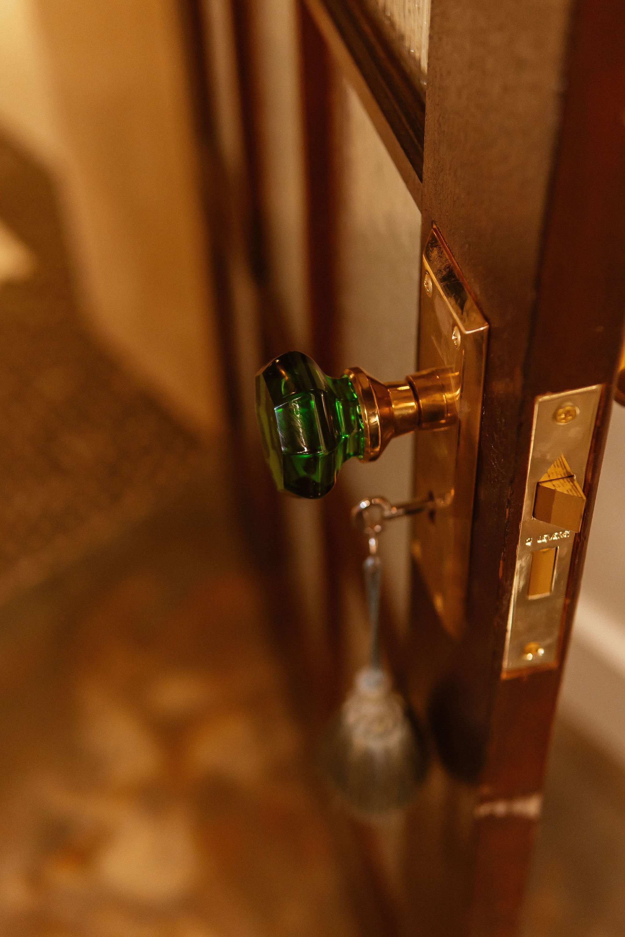 Art deco golden and emerald door knob