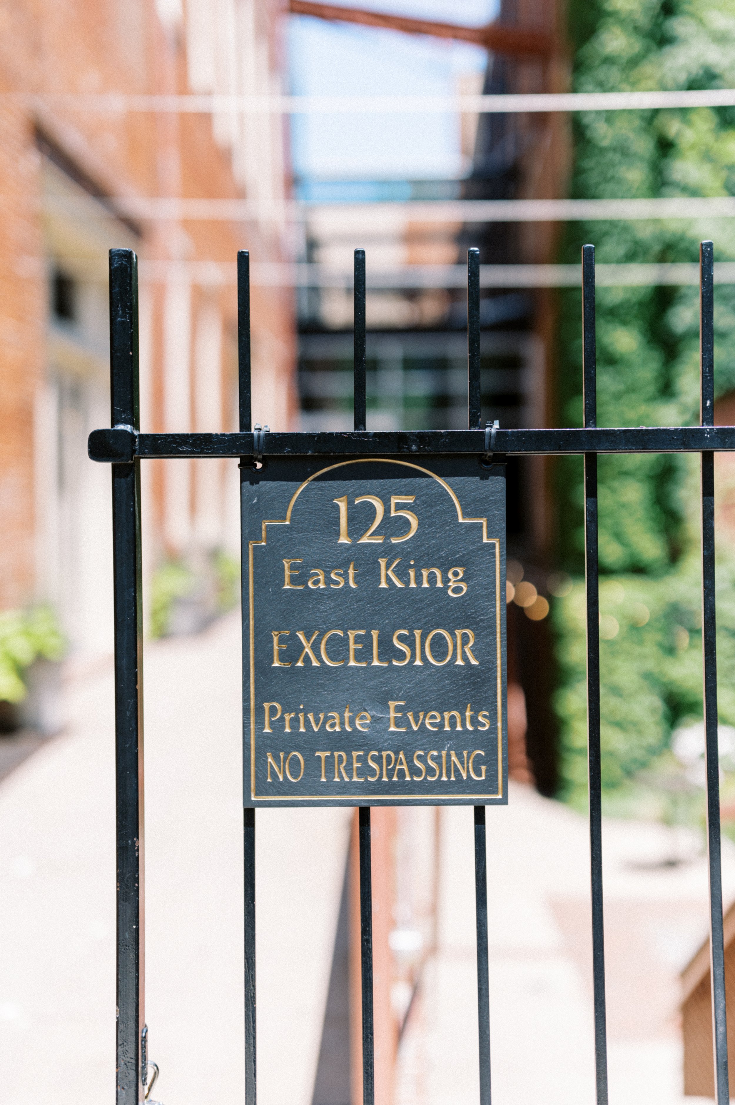 Excelsior front gate sign
