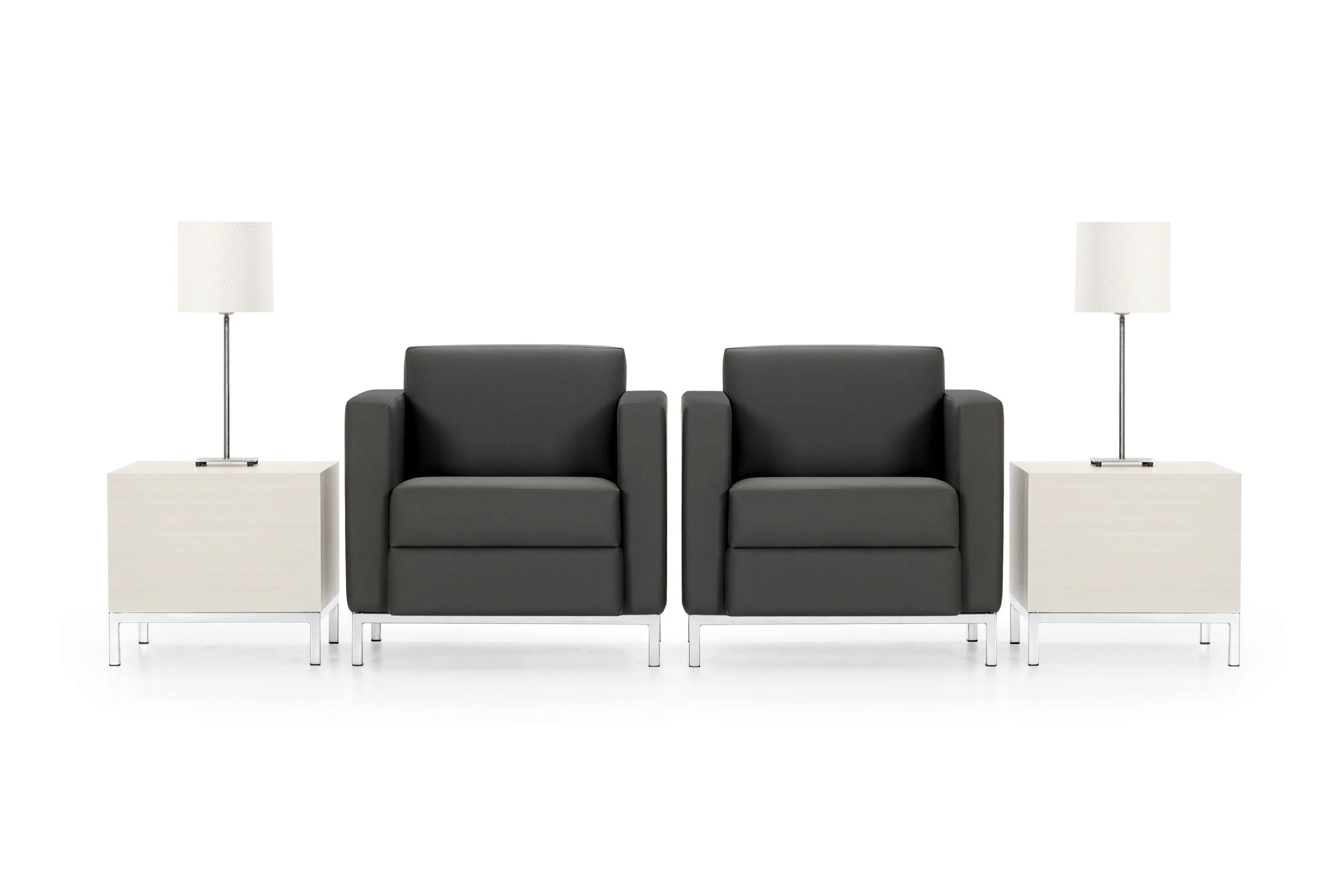 two office chairs with side tables