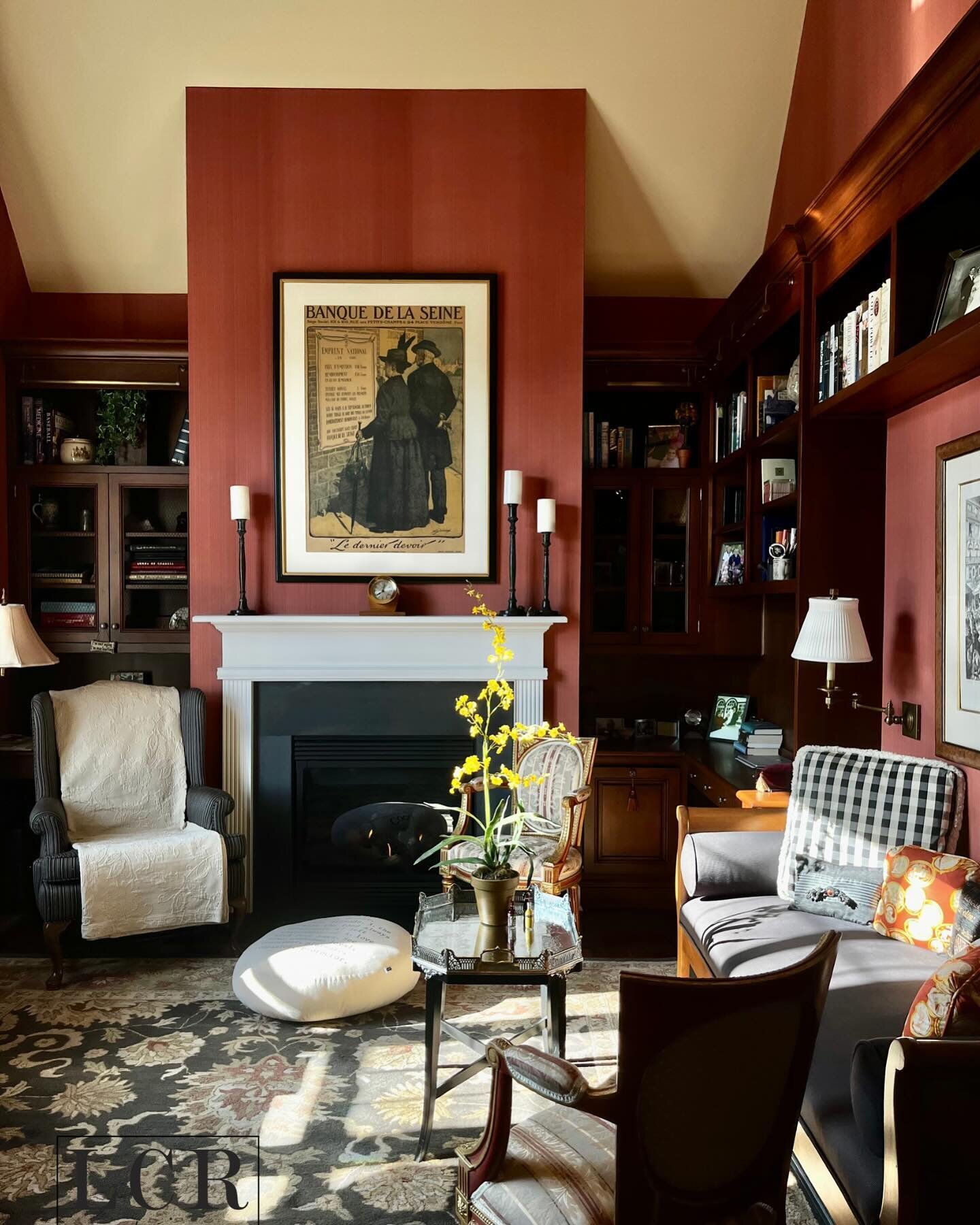 Enter into an English Country Traditional styled parlor room. Designed fabulously by our principal designer, Peter Robbin. A moody library and sitting room highlighted by dark woods, patterns and fabrics. Note the gorgeous afternoon sunlight peeking 