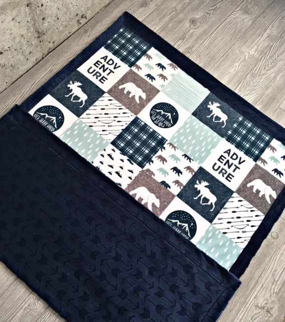 Luxe minky blanket handmade by MoonSheets using the Happy Camper Wholecloth design. 