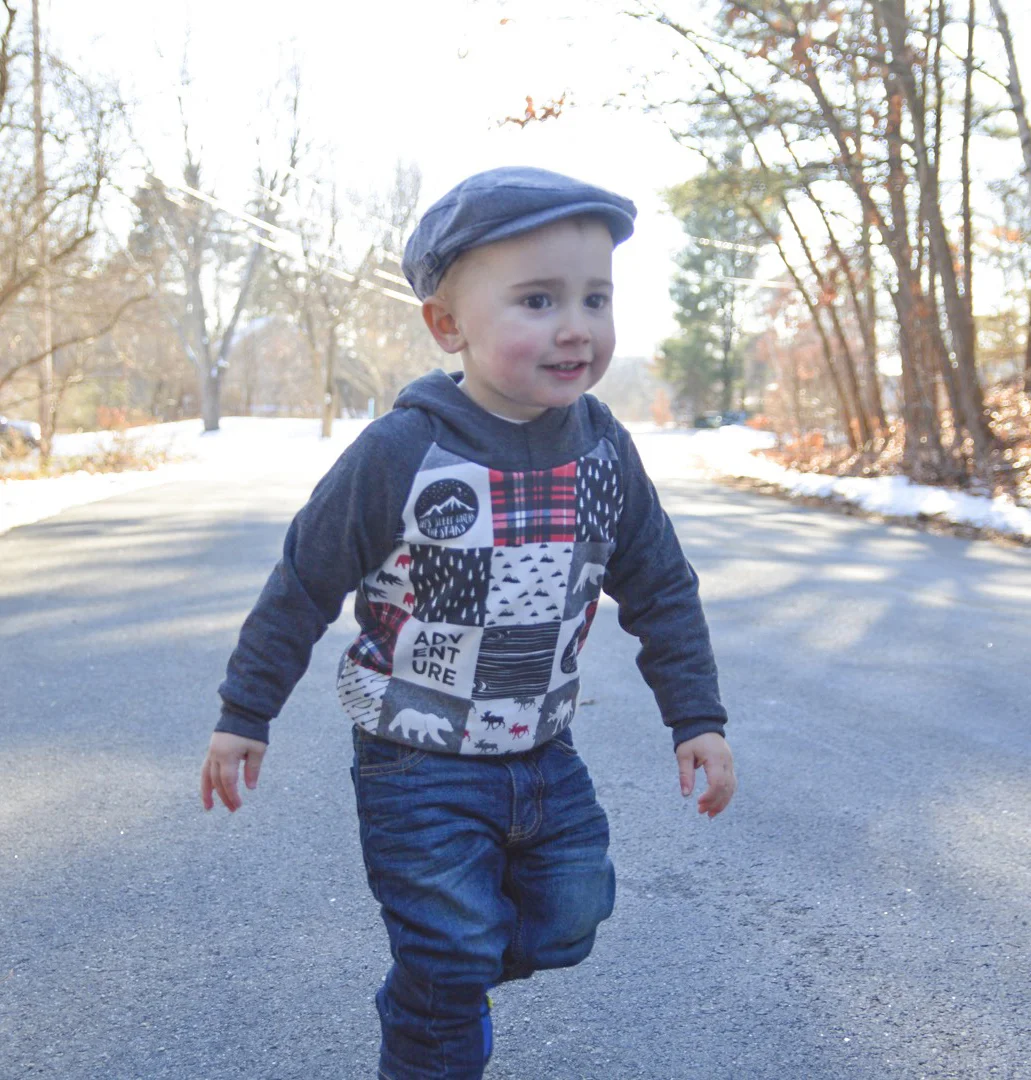 Toddler hoodie handmade by GooseLovesLamb using the Happy Camper Wholecloth design.