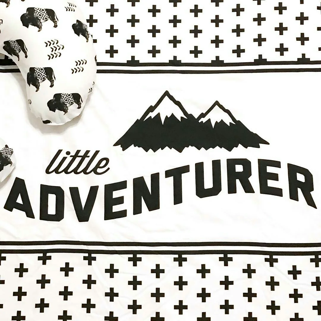 Blanket and Boppy Cover made handmade by TheModernRobin using the Little Adventurer & Aztec Buffalo design.