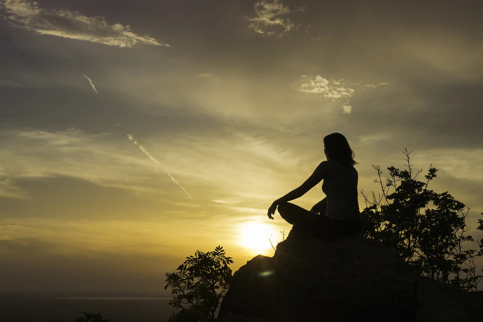 bigstock-Girl-Practicing-Yoga-On-The-Mo-239100070.jpg
