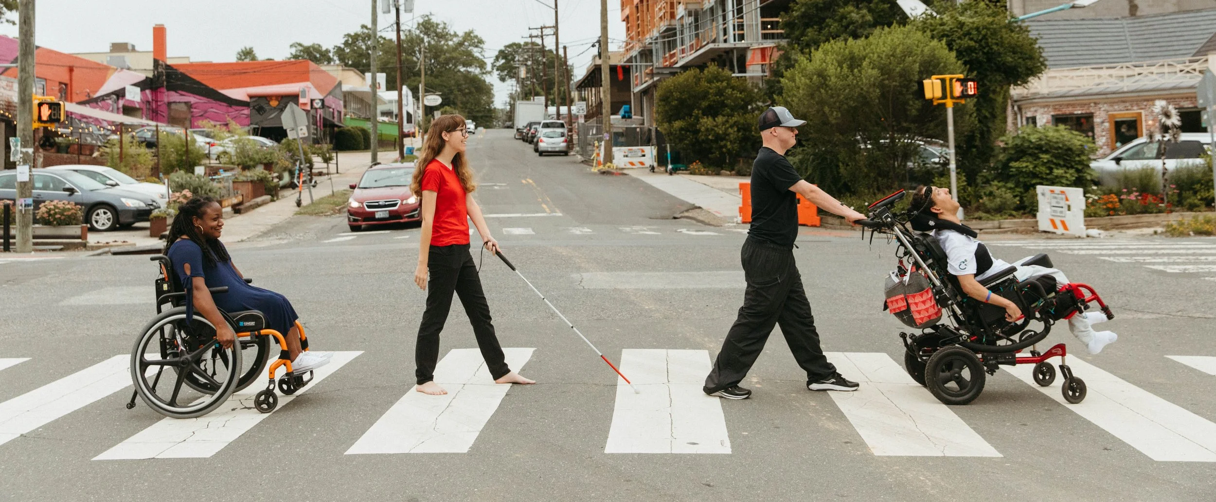 From left to right:  Suvya Carroll, Tatum Tricarico, Alex Furiness, Sloan Meek crossing the street