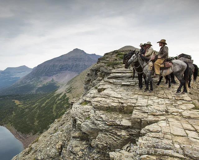 Ben Masters (on the gray horse) riding the trail for the film, book and multi-content feature Unbranded. 