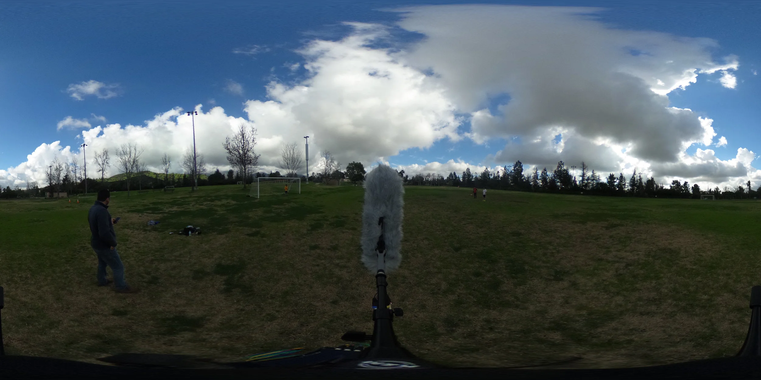 EXT_Day_Park_SmallGroupPlayingSoccer_DistantTraffic_Stereo.JPG