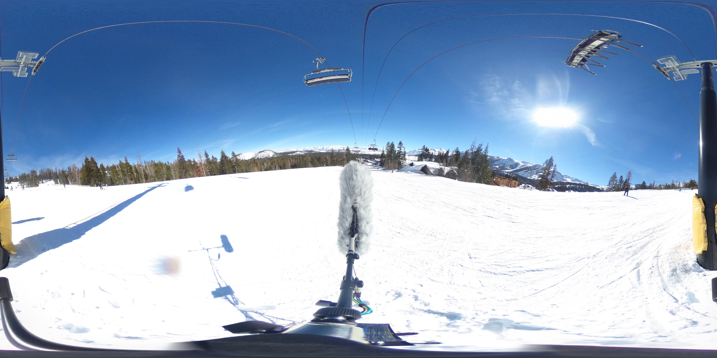EXT_Day_SkiSlope_SkiLiftOverhead_SkiBys_SnowboardBys_VariousVoices_2_JPEG.JPG