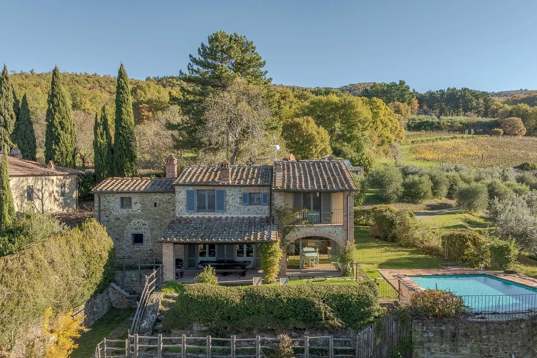 56-Acre Tuscan Vineyard Estate with Three Farmhouses Near Arezzo