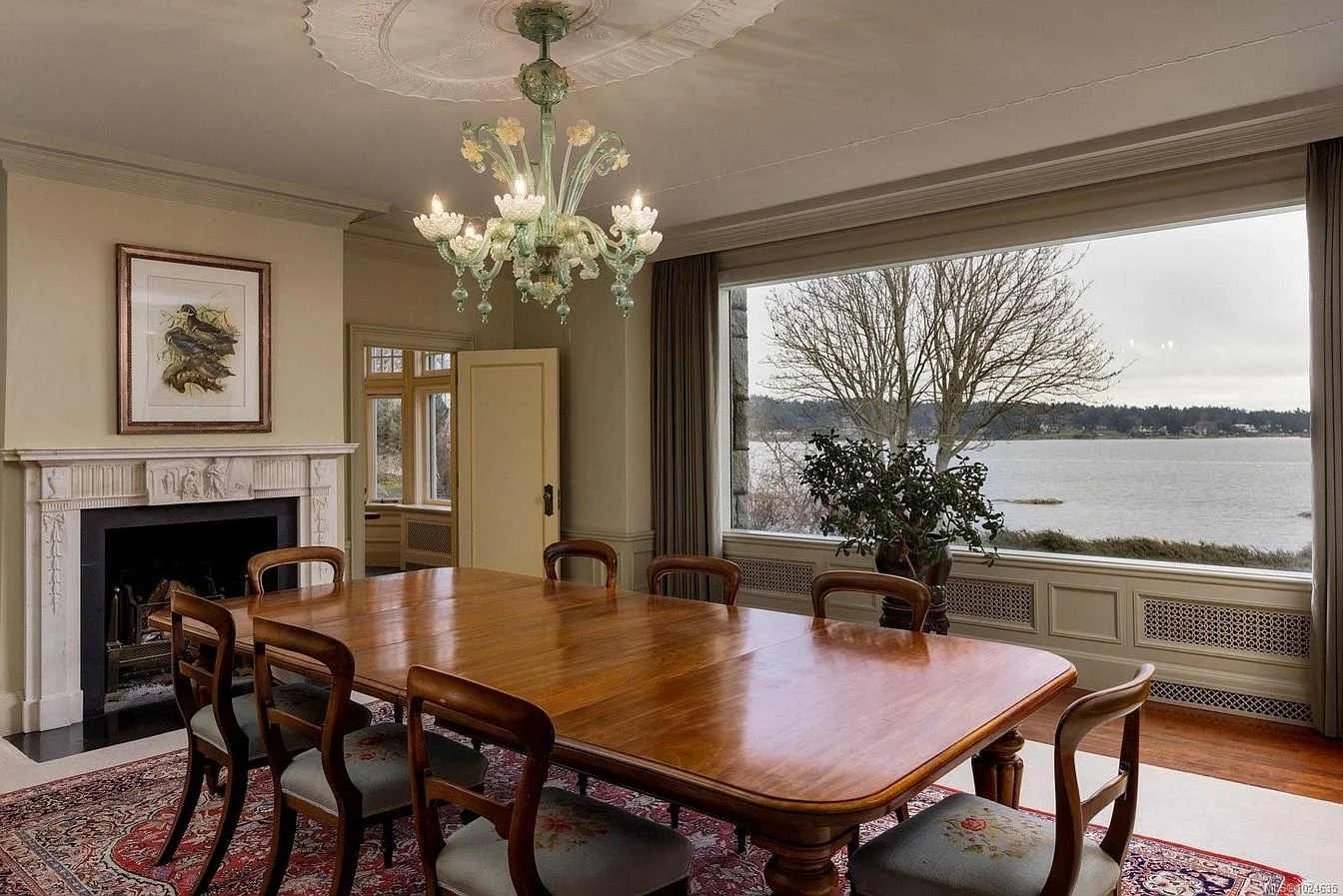 The dinning room 260 year old hand-carved Adam fireplace mantel