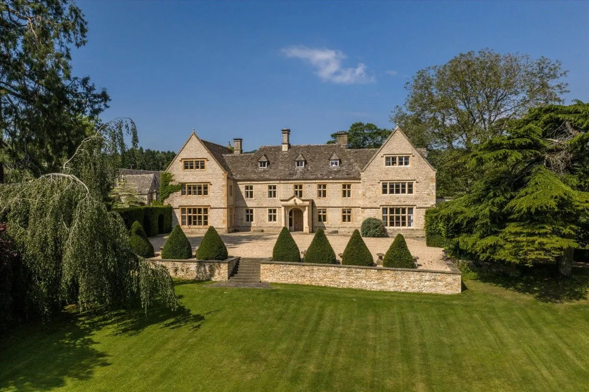 A Cotswolds Manor on 60 Acres With a Party Barn, Walled Pool, Tennis Court, and a Kitchen Garden