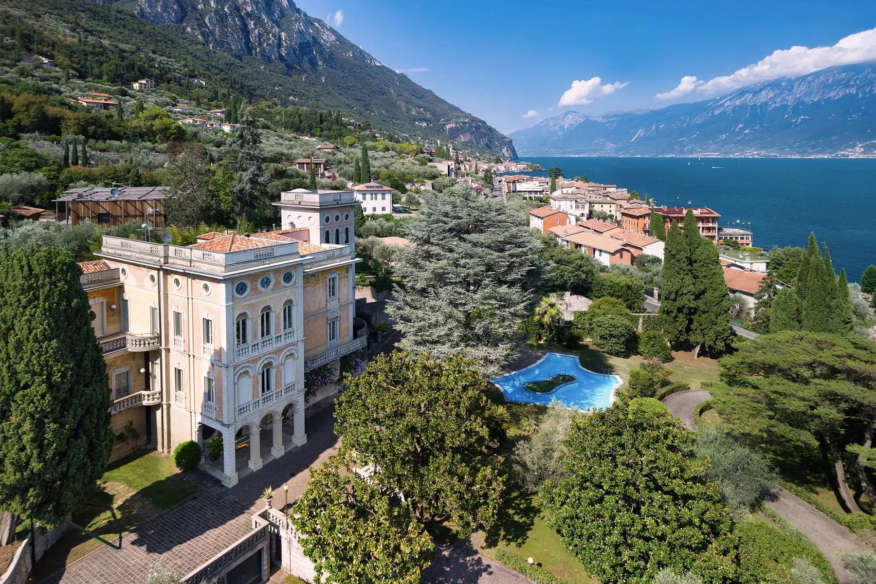 A Pink Palazzo Set in a Centuries-Old Private Park Overlooking Lake Garda, Italy