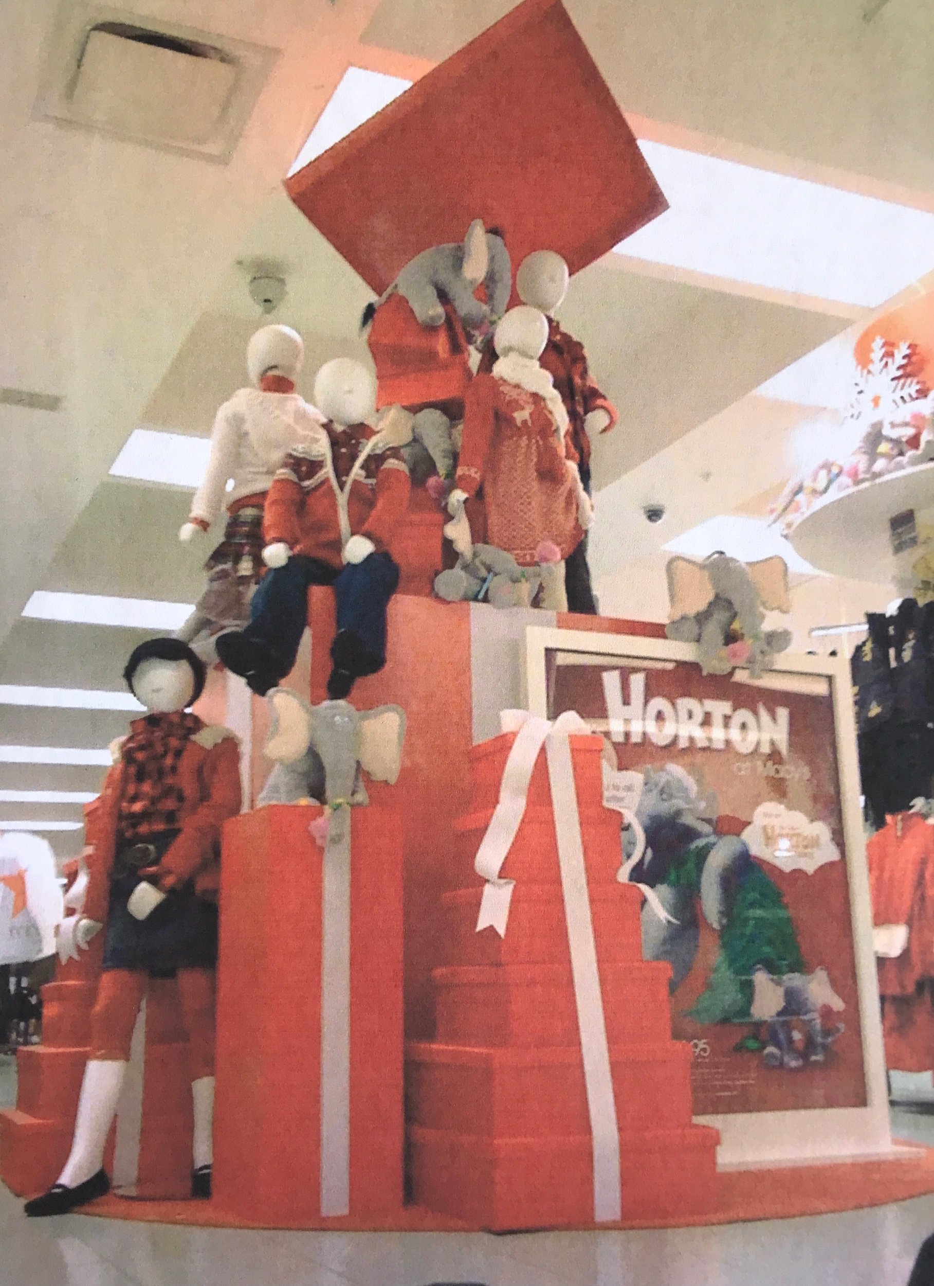 For this Horton Hears a Who display at Macy’s we made an oversized gift box out of a packing crate and red vinyl! Inventive and on budget, and oh so cute!