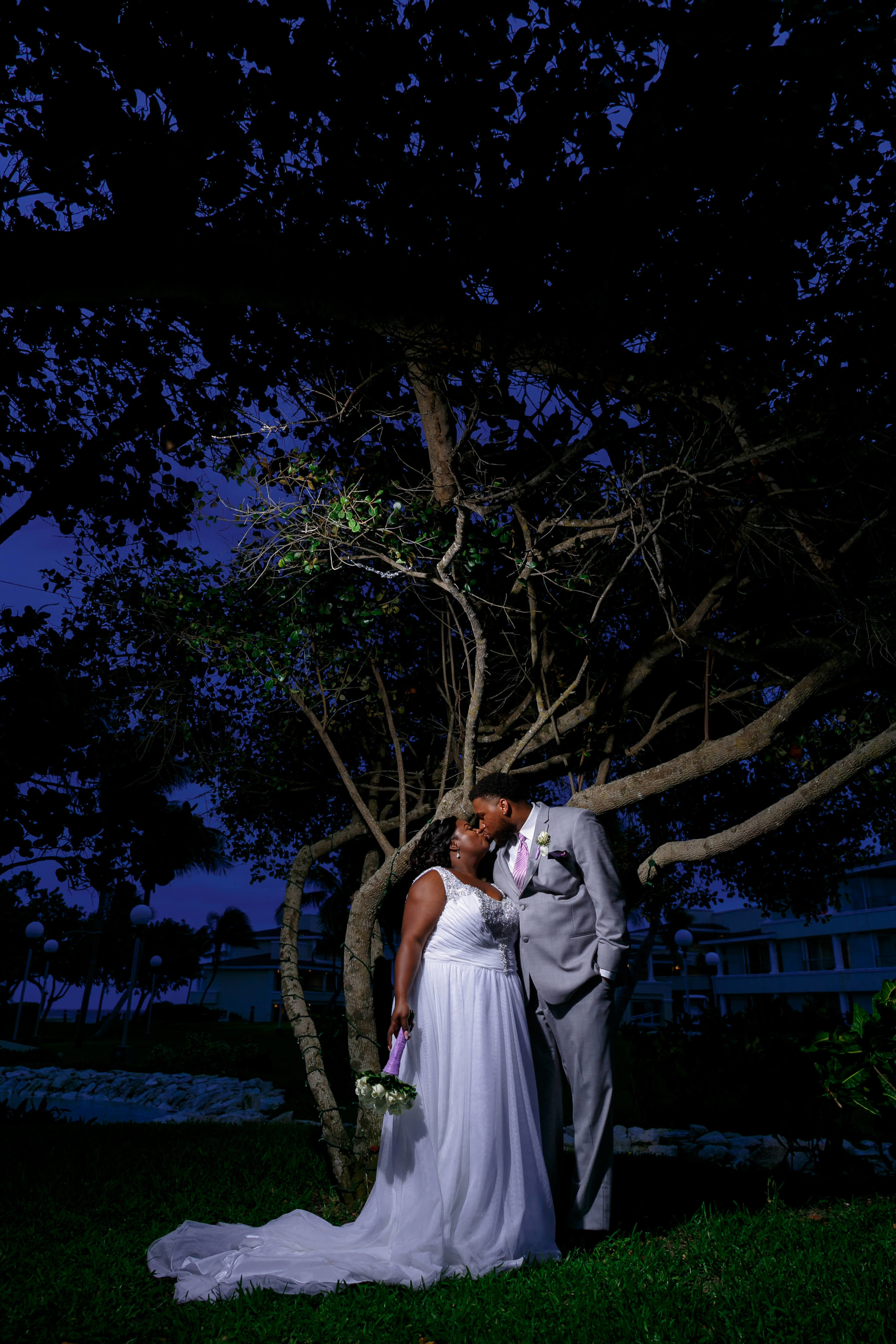 tressa-how-to-plan-a-destination-wedding-in-cancun-mexico-moon-palace-resort-black-destination-bride-destiland-desti-guide-to-destination-weddings-night-couple.jpg