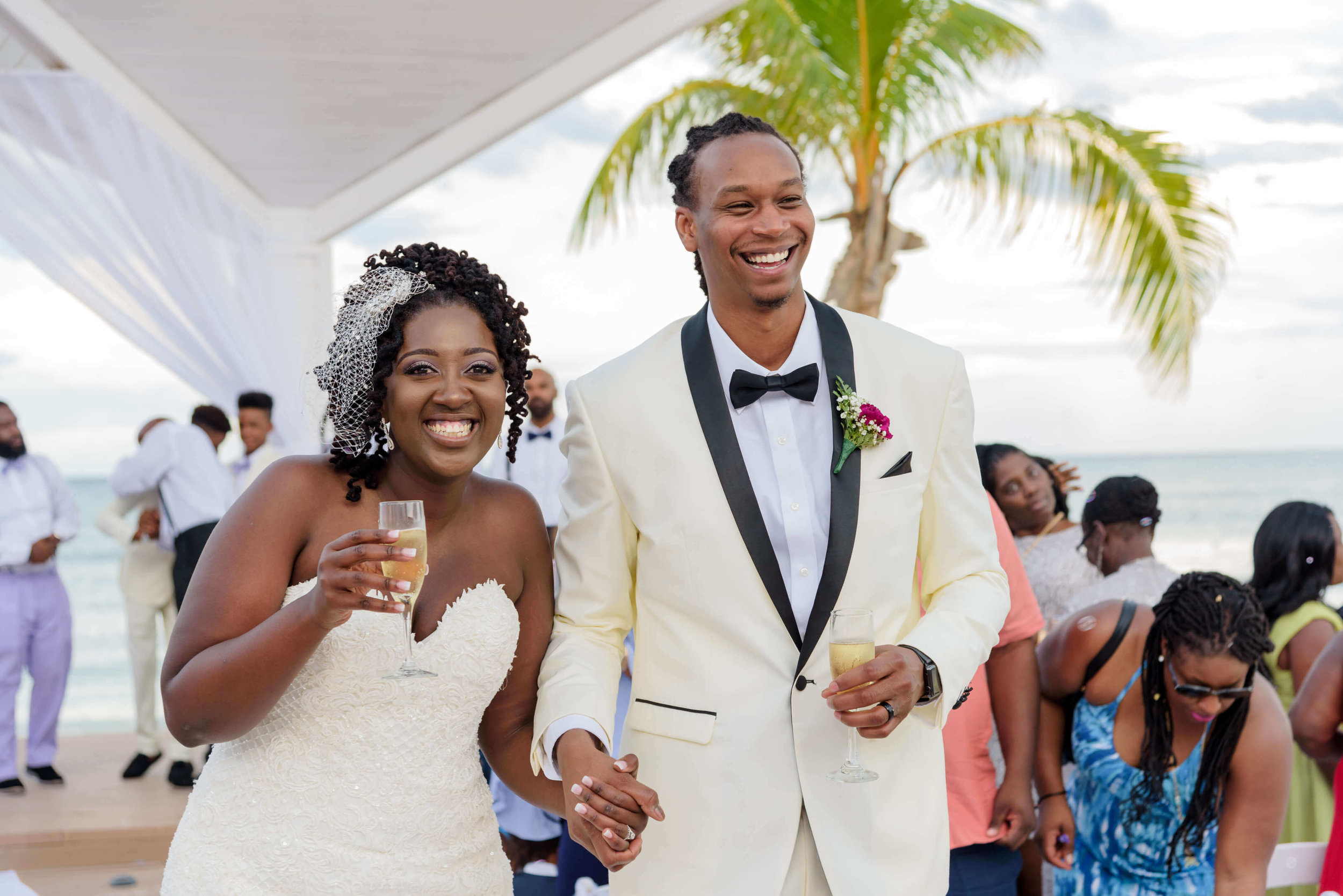 jamellah-how-to-plan-a-destination-wedding-in-montego-bay-jamaica-royalton-blue-waters-black-destination-bride-destiland-desti-guide-to-destination-weddings-couple-after-ceremony.jpg