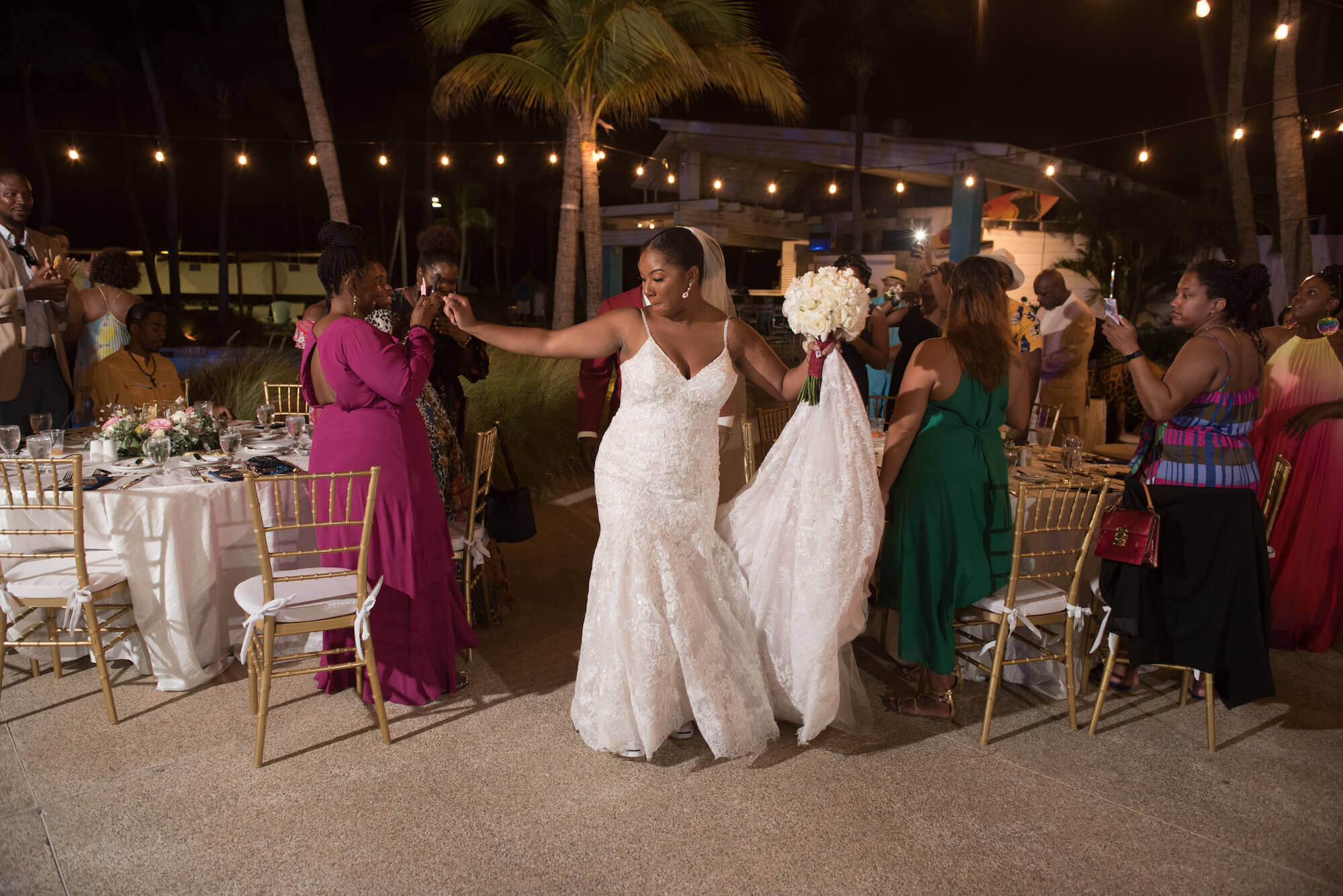 laura-how-to-plan-a-destination-wedding-in-oranjestad-aruba-hilton-aruba-resort-black-destination-bride-desti-tv-desti-guide-to-destination-weddings-2020-bride-dancing.jpg