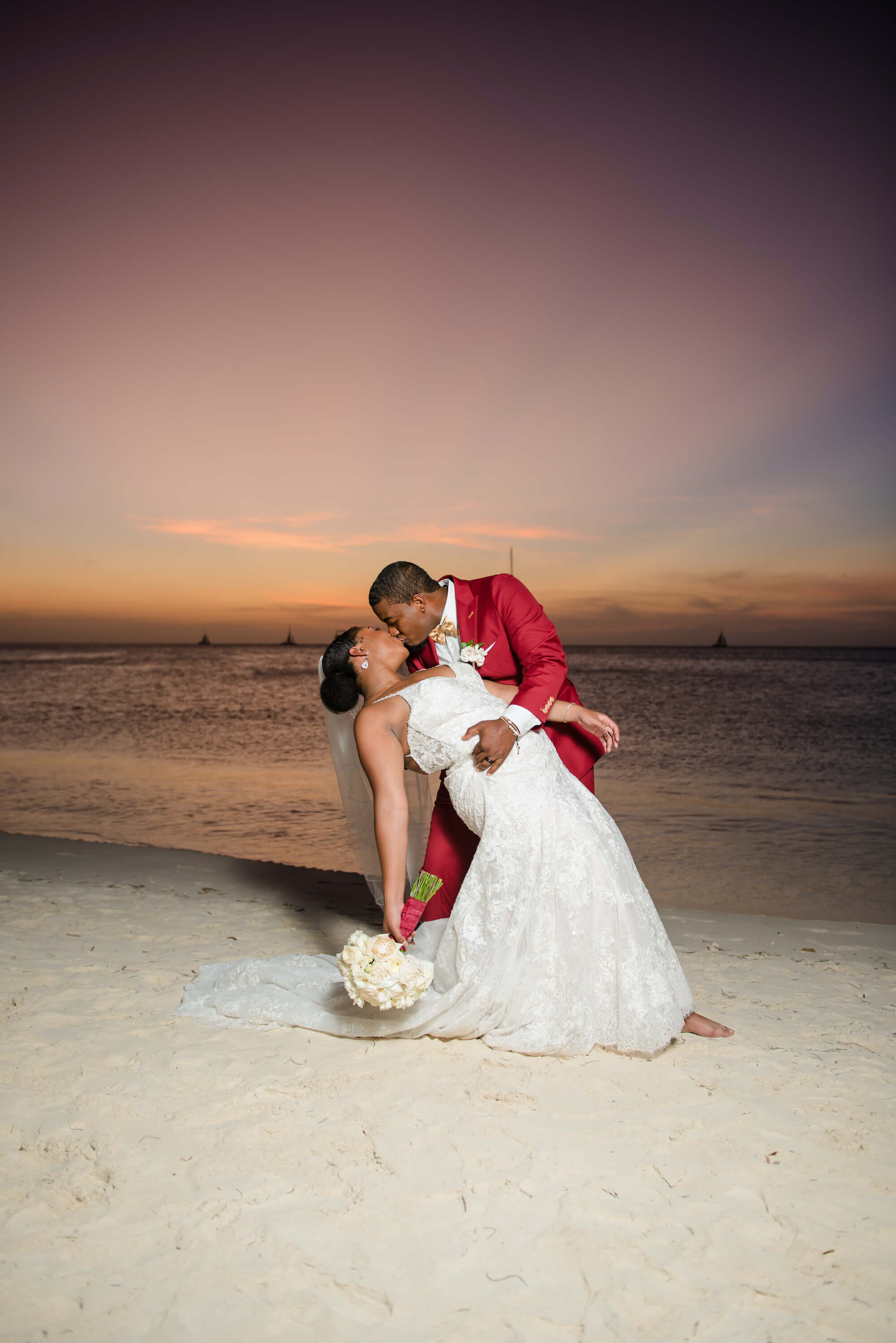 laura-how-to-plan-a-destination-wedding-in-oranjestad-aruba-hilton-aruba-resort-black-destination-bride-desti-tv-desti-guide-to-destination-weddings-2020-beach-couple.jpg