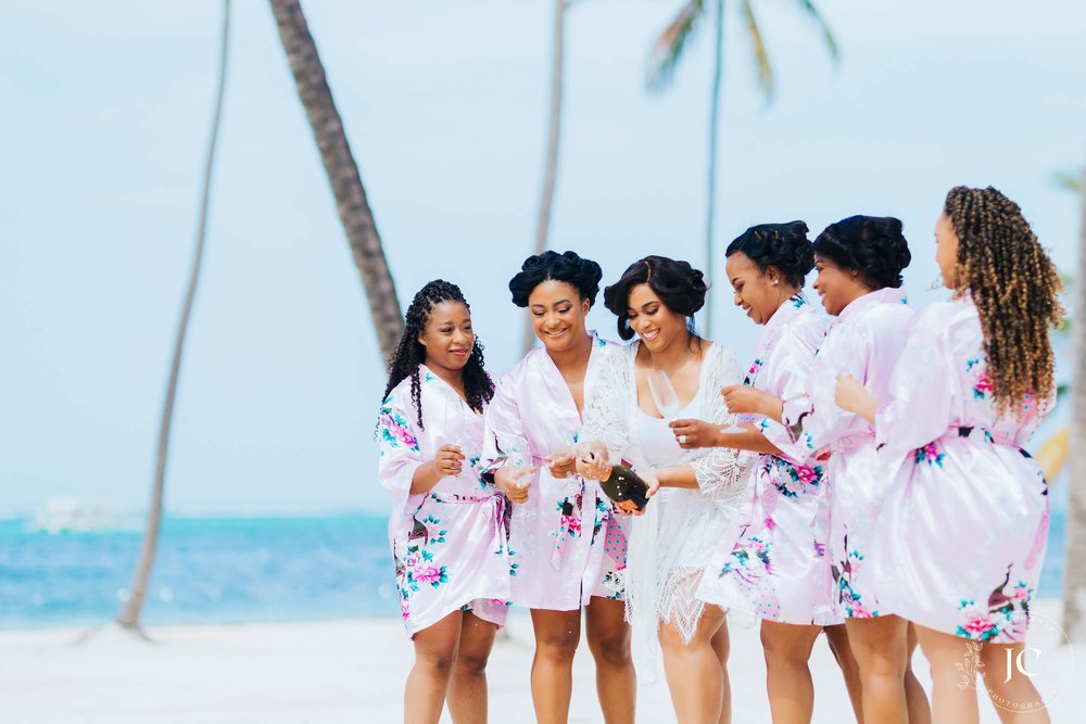 destibride-nicole-how-to-plan-a-destination-wedding-in-punta-cana-dominican-republic-jellyfish-restaurant-black-destination-bride-desti-tv-desti-guide-to-destination-weddings-2021-getting-ready-bridal-party-on-beach.jpg