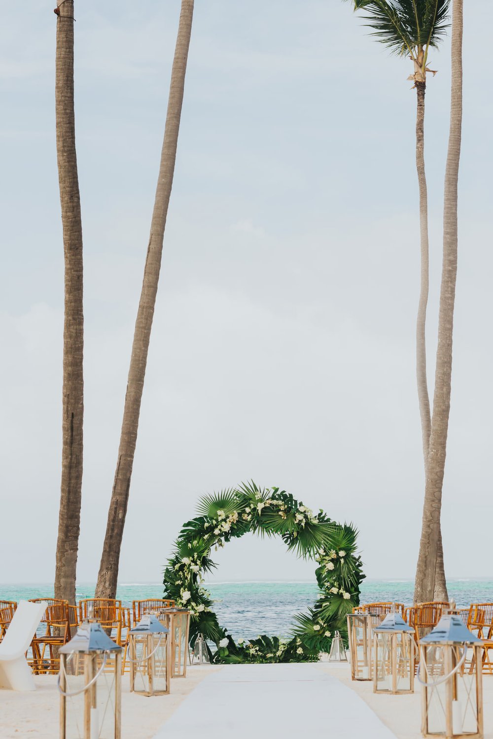 destibride-nicole-how-to-plan-a-destination-wedding-in-punta-cana-dominican-republic-jellyfish-restaurant-black-destination-bride-desti-tv-desti-guide-to-destination-weddings-2021-circular-beach-wedding-arch-2.jpg