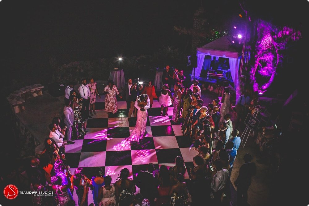 alstons-how-to-plan-a-destination-wedding-in-negril-jamaica-pattoo-castle-black-destination-bride-desti-tv-desti-guide-to-destination-weddings-desticouple-2021-reception-party-checkered-dance-floor.jpg