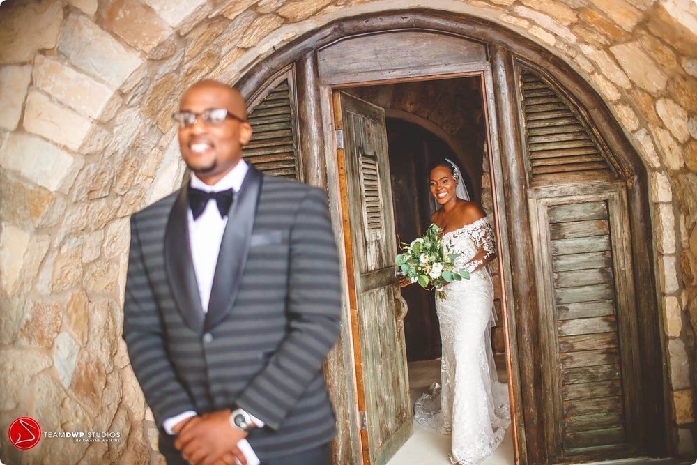 alstons-how-to-plan-a-destination-wedding-in-negril-jamaica-pattoo-castle-black-destination-bride-desti-tv-desti-guide-to-destination-weddings-desticouple-2021-groom-first-look.jpg