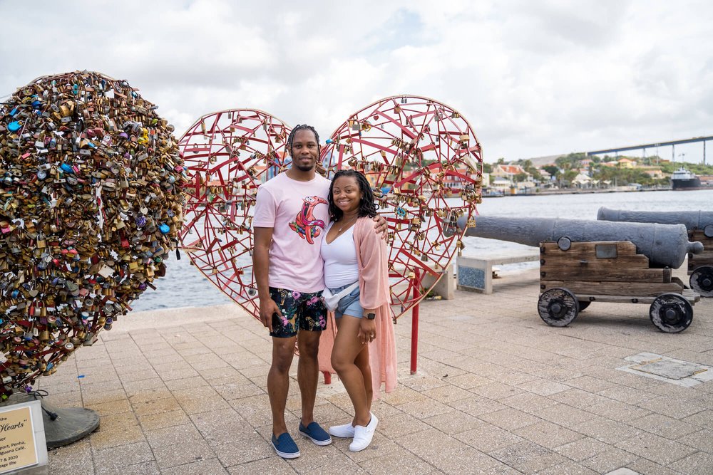 Brittany-how-to-plan-a-destination-wedding-in-willemstad-curacao-dreams-curacao-resort-review-natural-hair-locs-black-destination-bride-desti-tv-desti-guide-to-destination-weddings-2022-excursion-punda love-hearts.jpg