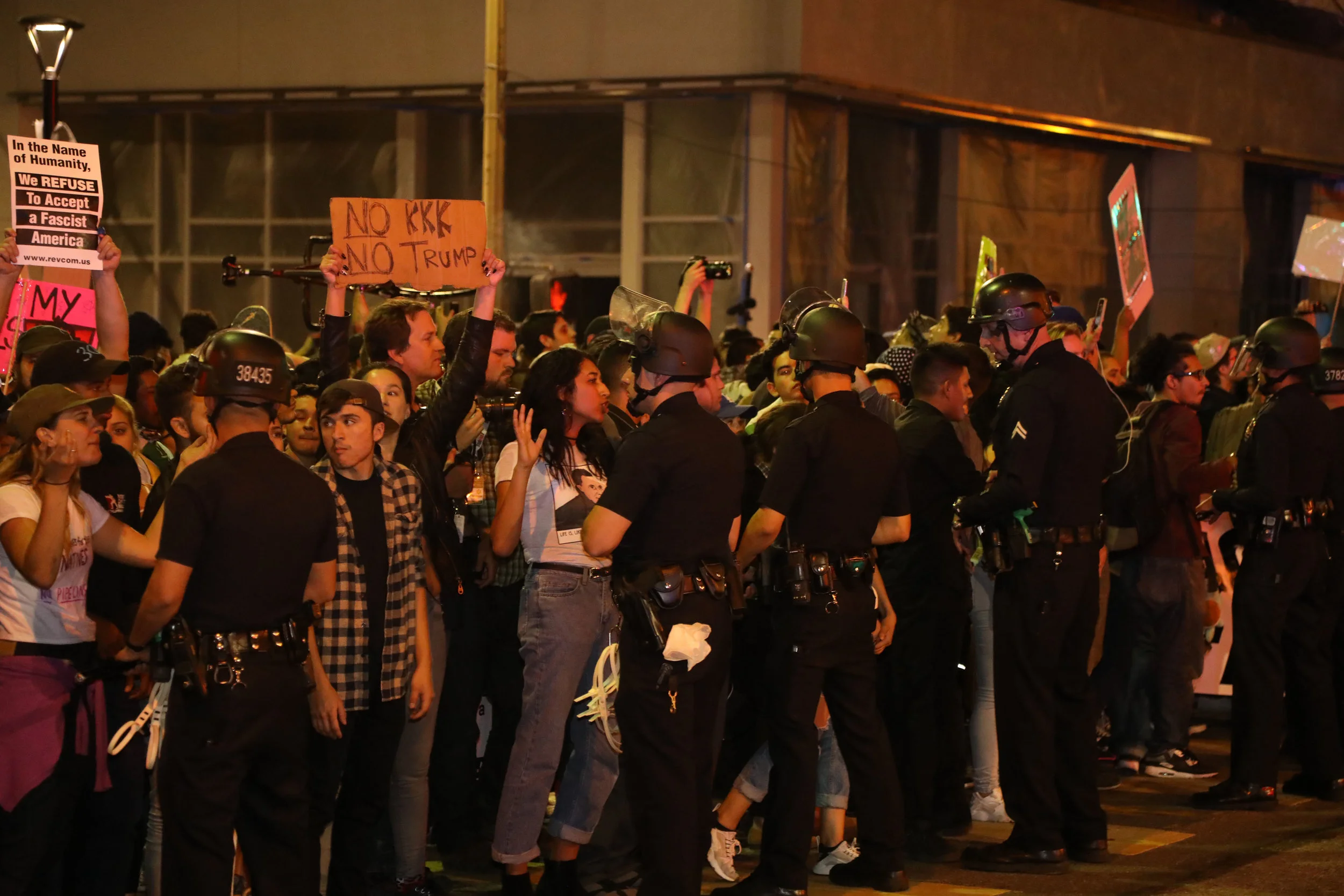 Protesters and L.A.P.D. Officers meet at an innersection at the protest held in response to the outcome of the presidential election in Downtown Los Angeles on Nov. 9, 2016