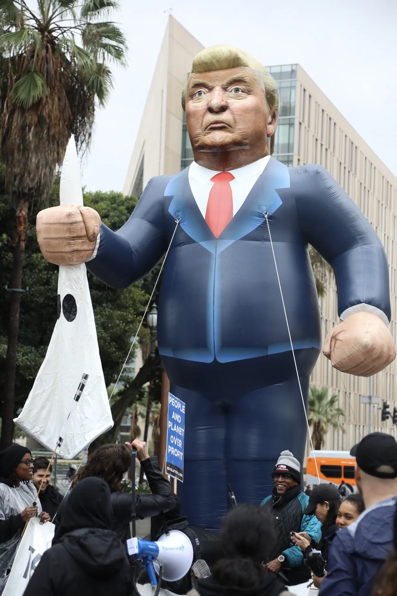 A float depicting President Trump holding a KKK outfit during the United Against Hate march on Friday Jan. 20, 2017