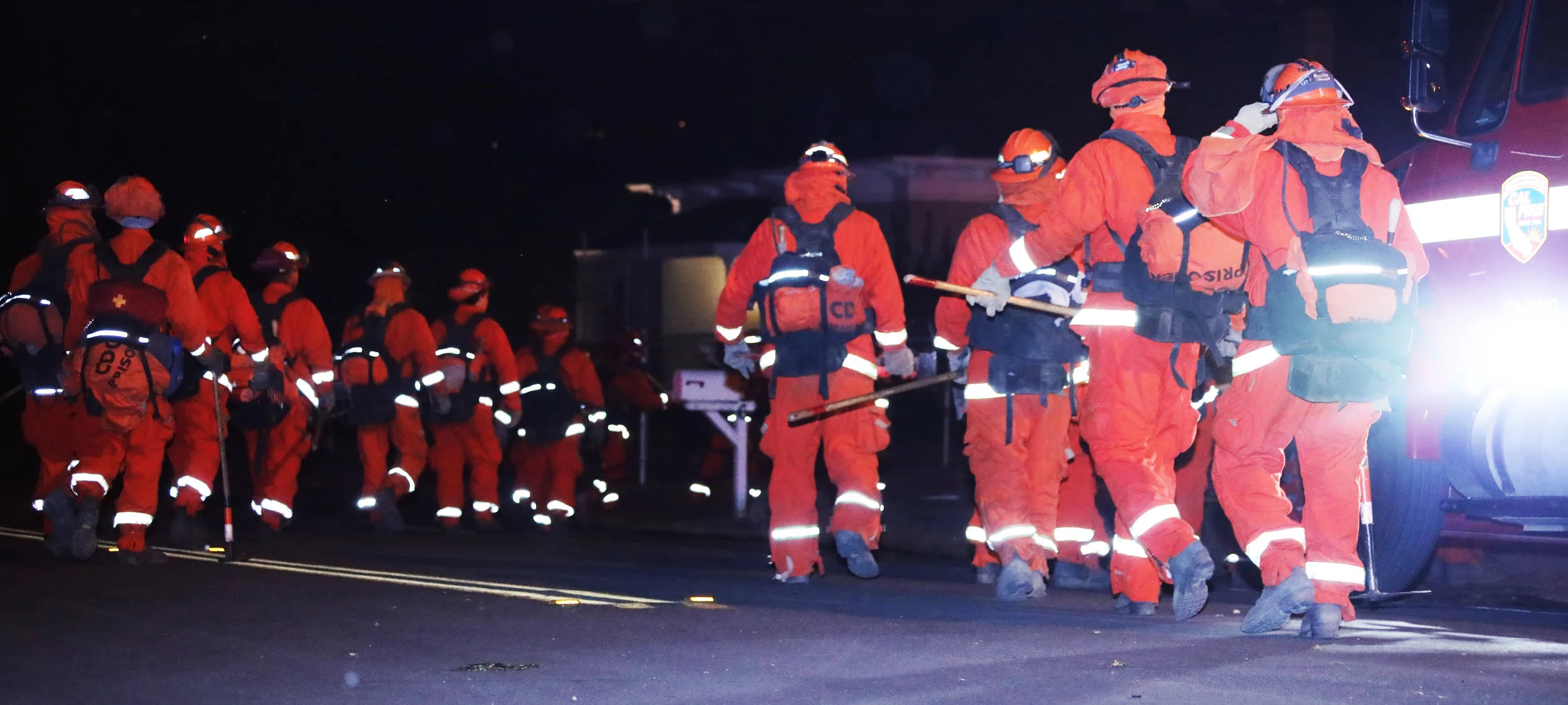 Michael Watkins/ Courier Two strike teams from the California Department of Corrections and Rehabilitation go in to assist Firefighters from Ventura County in cutting fire lines during the Thomas Fire in Santa Paula, Calif. in the early morning hours on tuesday December 5th, 2017. 