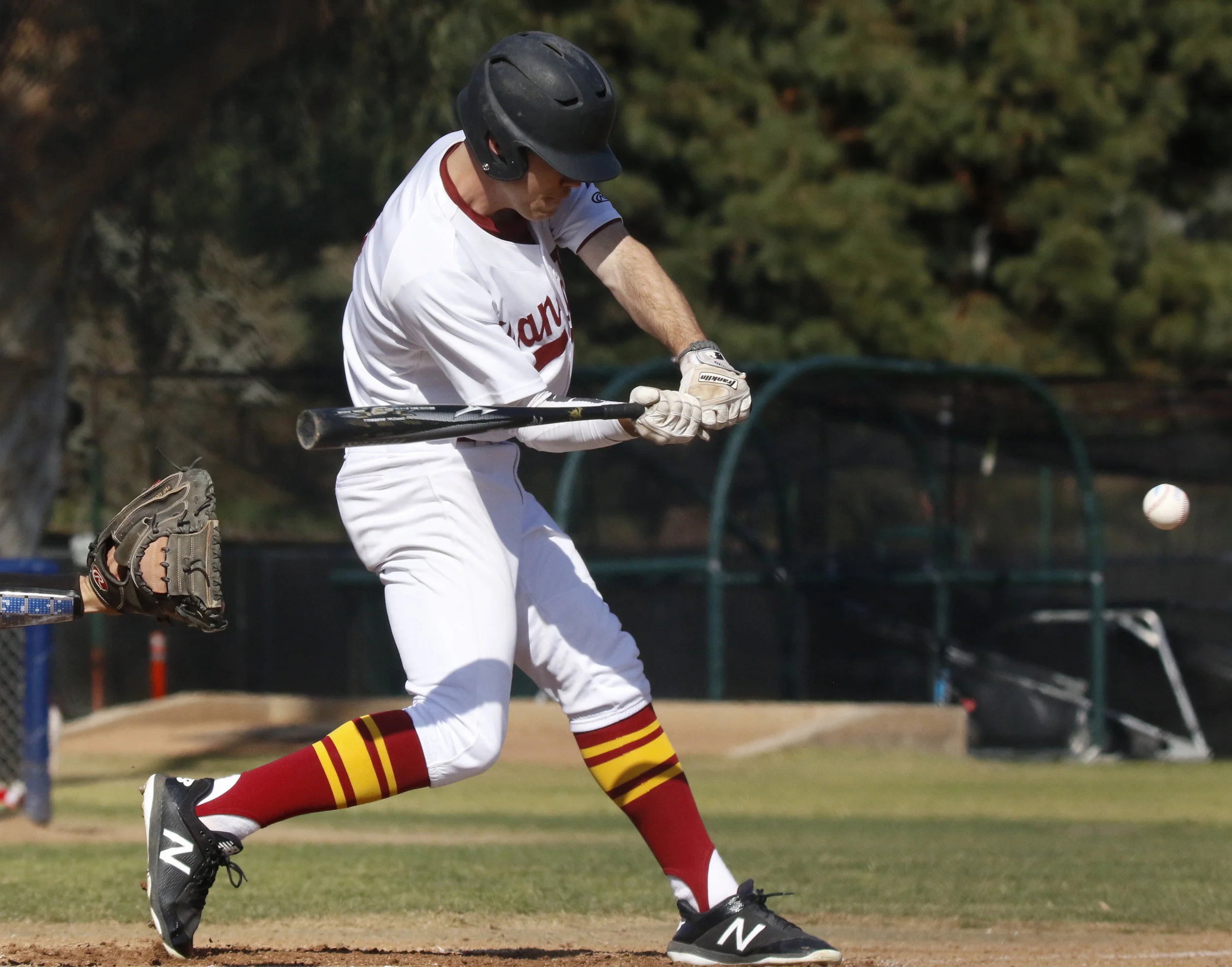 Michael Watkins/ Courier Daniel Netz of PCC turns on a 2-2 pitch during PCC’s 6-3 home win over Santa Barbara City College on Wednesday, February 28, 2018. 