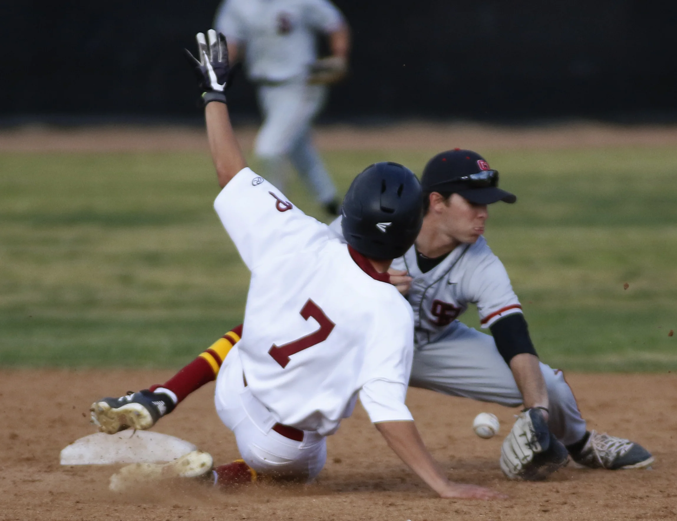 Michael Watkins/ Courier Edward Manzo (7) of PCC slides to beat a throw to second for a double during PCC’s 6-3 home win over Santa Barbara City College on Wednesday, February 28, 2018. 