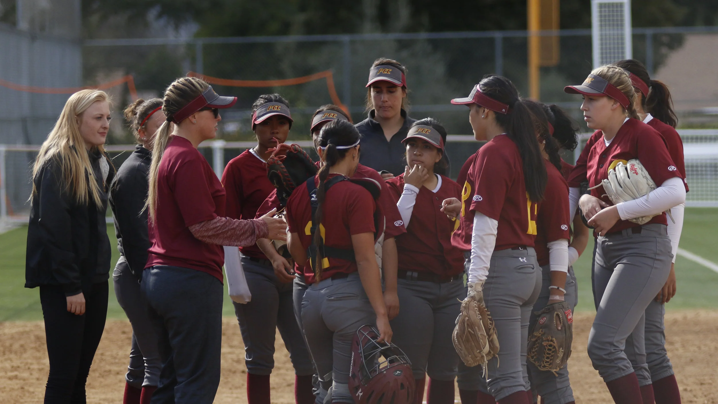 Michael Watkins/ Courier The Pasadena City College Lancers huddle up during a game.