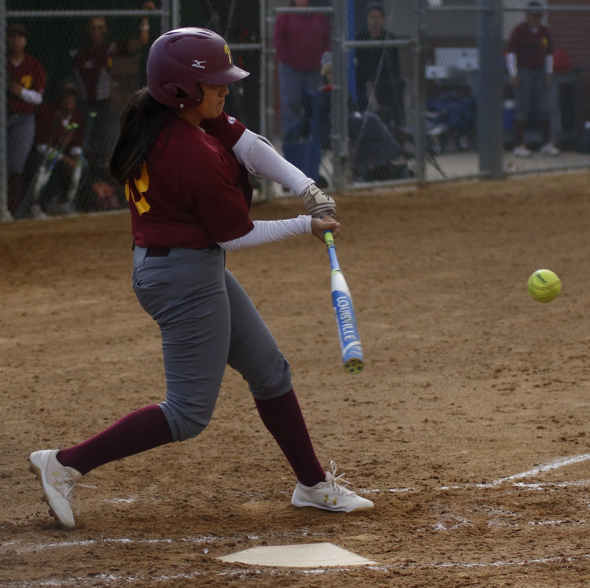 Michael Watkins/ Courier Kaylee Medrano of PCC turns on a pitch during the lancers 7-2 home loss against Chafyey College on Tuesday, February 27, 2018