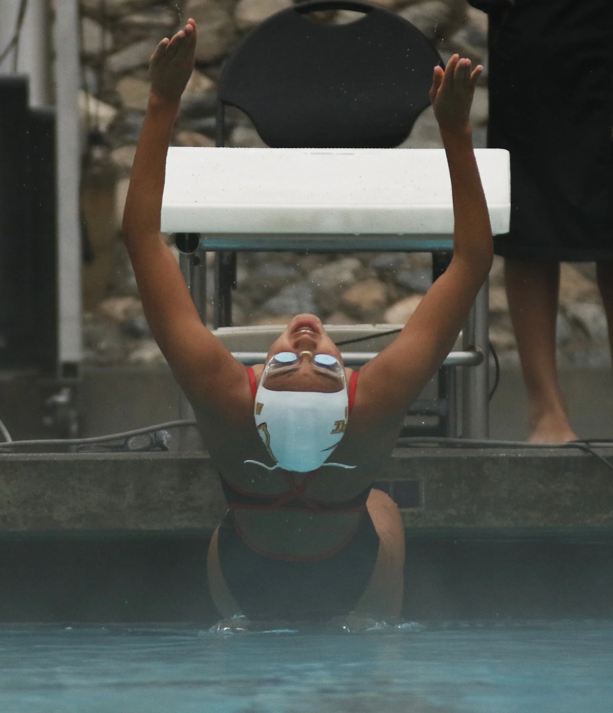 Michael Watkins/ Courier Melissa Cienega of Pasadena City College competes in the womens 200 yard backstroke during the SCC Double Dual at home on Friday, March 2, 2018.